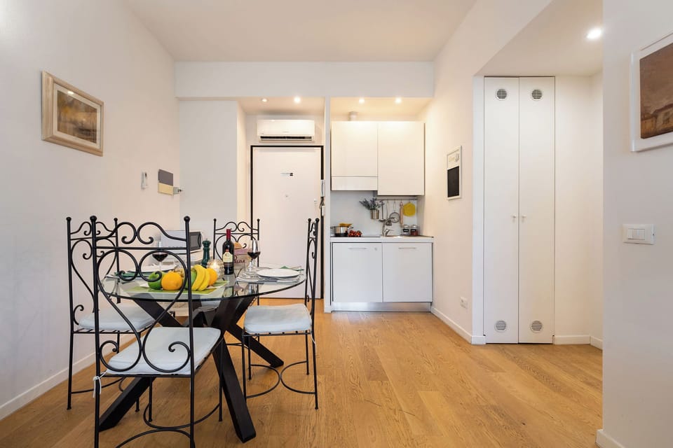 Apartment (1 Bedroom) | Living area | 32-inch Smart TV with cable channels