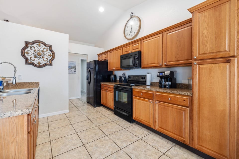 Kitchen with Fridge, Stove, Coffee Pot, Keurig, Toaster, Microwave