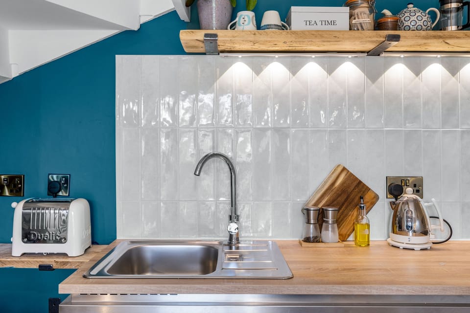 Kitchen area close up includes a small dishwasher
