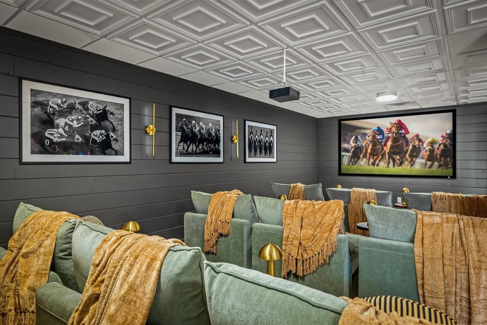 Equestrian-themed cinema with plush recliners for a luxury movie night