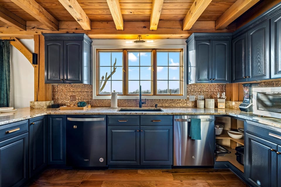 Chef's kitchen with dual dishwashers—fully equipped for groups of 21