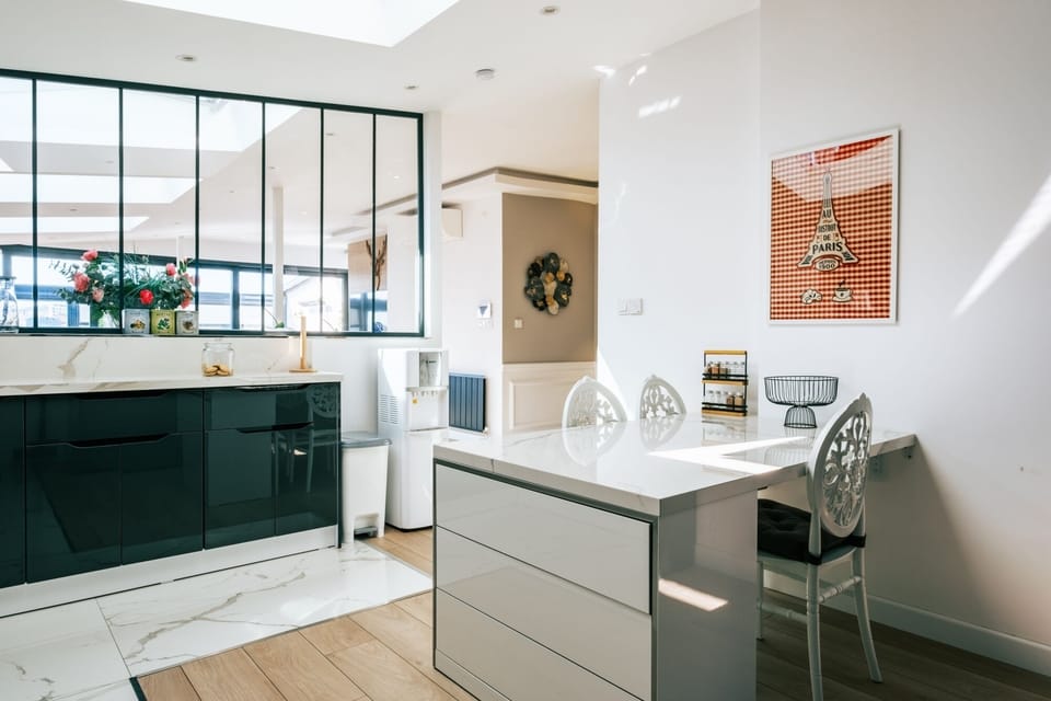 There is also a dining table in the kitchen.