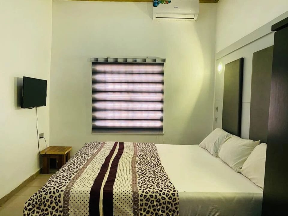 Deluxe Room, Balcony, City View | Desk, laptop workspace, blackout drapes, soundproofing