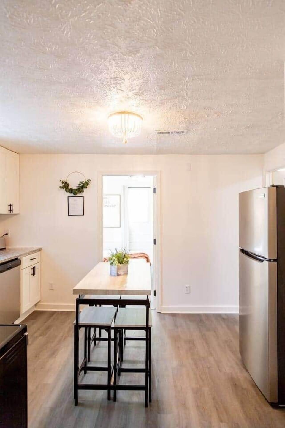 Sage Green Getaway - In kitchen dining area that can double as extra counter space when not used for dining purposes.