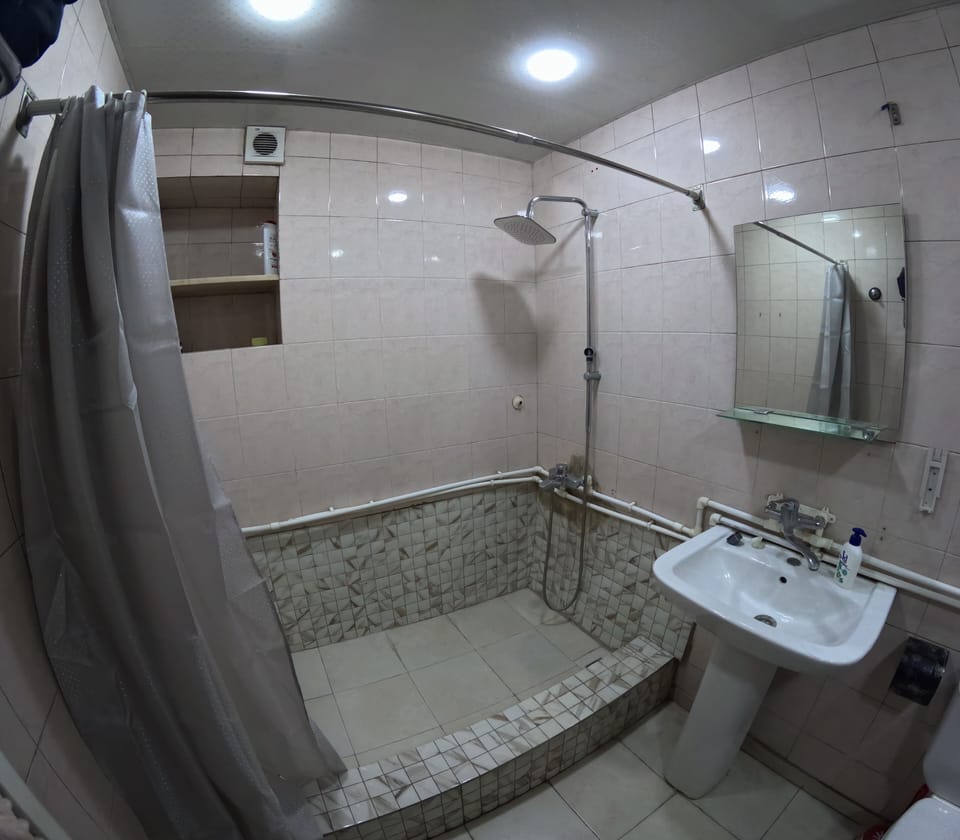 Economy Shared Dormitory | Bathroom | Shower, slippers, towels, soap