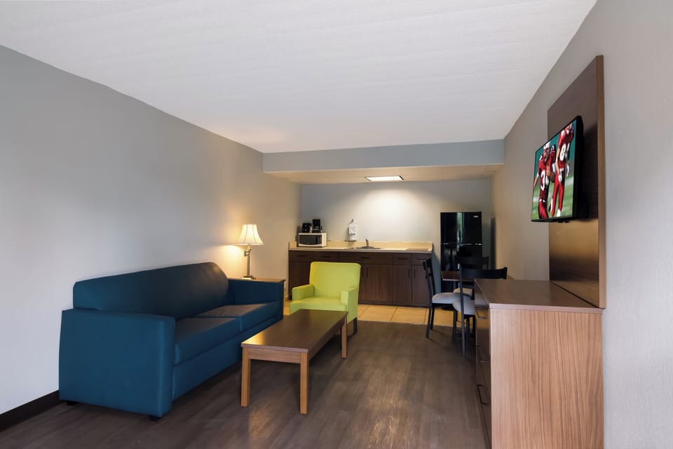 Suite, 1 King Bed, Non Smoking | Private kitchenette | Coffee/tea maker, full-size fridge, microwave, stovetop