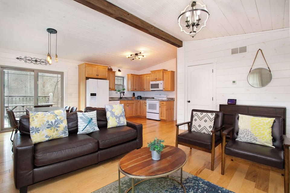 Enjoy a movie by the warm electric fireplace in this stylish, open-concept mountain retreat.