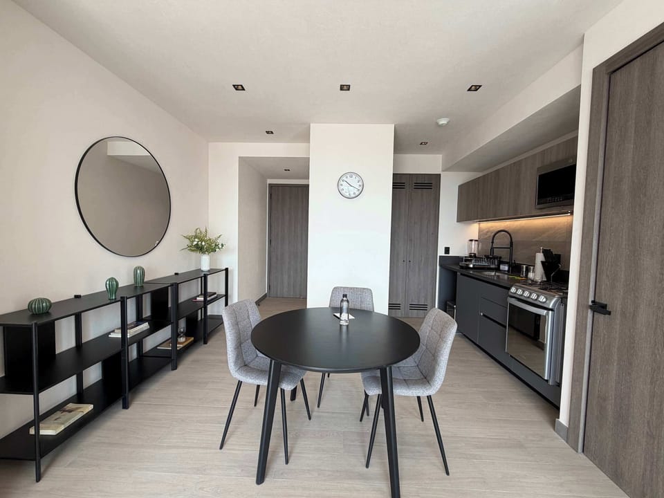 Stylish dining area ideal for meals or remote work.