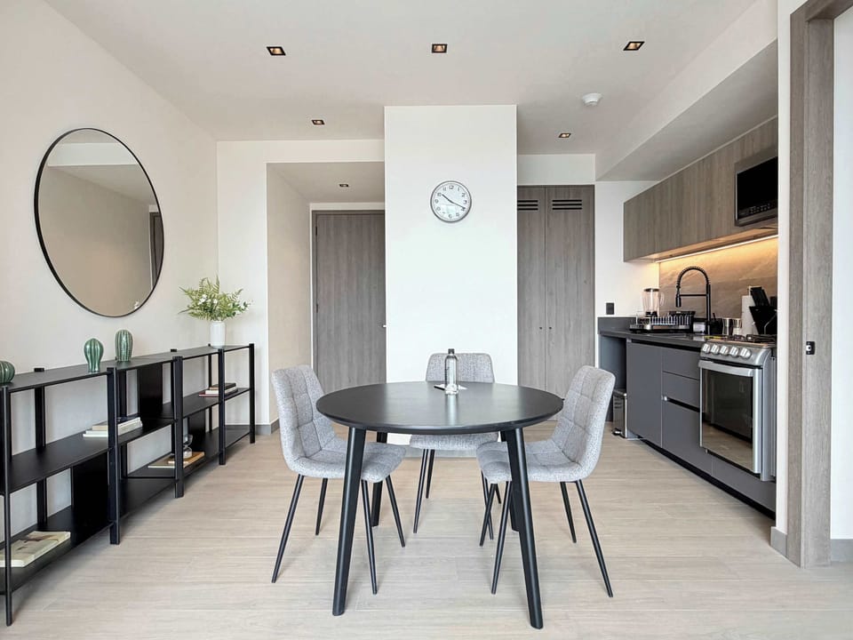 Dining space with modern furniture and a welcoming ambiance.