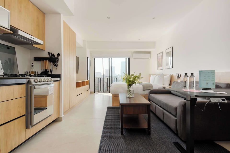 Modern and integrated living room and kitchen