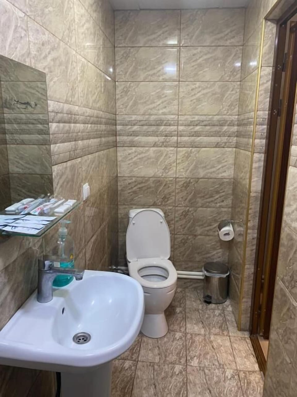 Twin Room, Courtyard View | Bathroom | Shower, hair dryer, slippers, towels