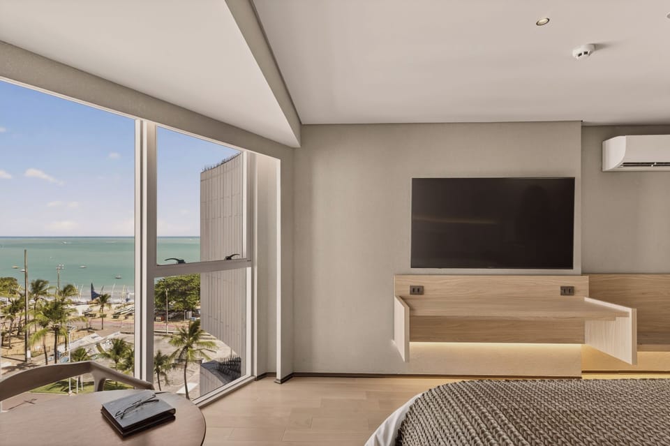 Premium Double Room, Partial Sea View | Egyptian cotton sheets, premium bedding, pillowtop beds, in-room safe