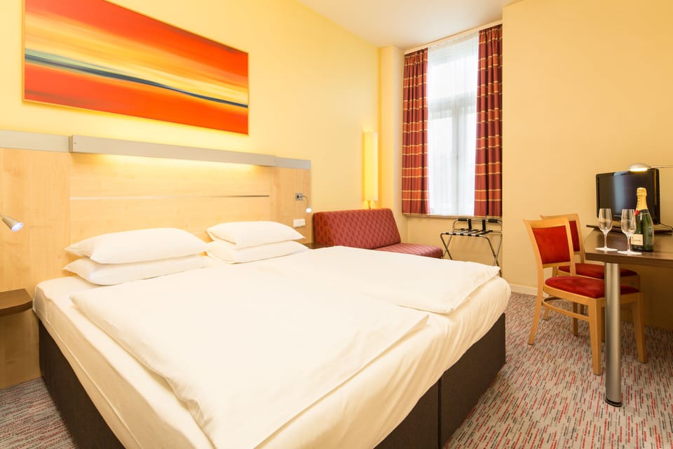 Premium bedding, desk, soundproofing, iron/ironing board