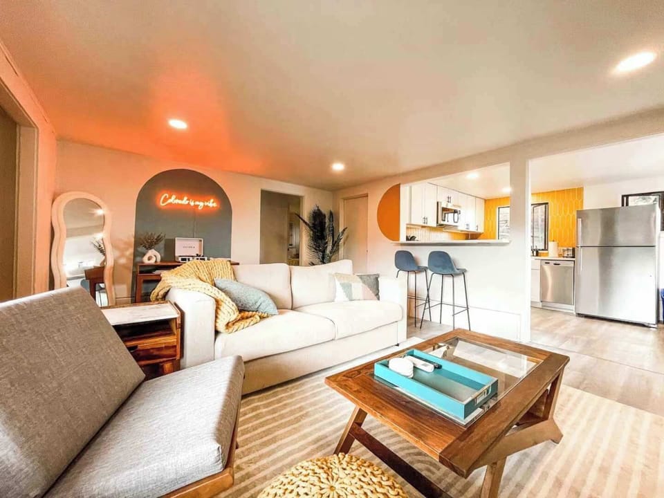 Welcome to Ivywild Peak! Perched on the upper level, this duplex unit features a stone accent exterior and a private entrance. Ascend the stairs to reach your exclusive deck and enjoy the privacy of this elevated retreat.