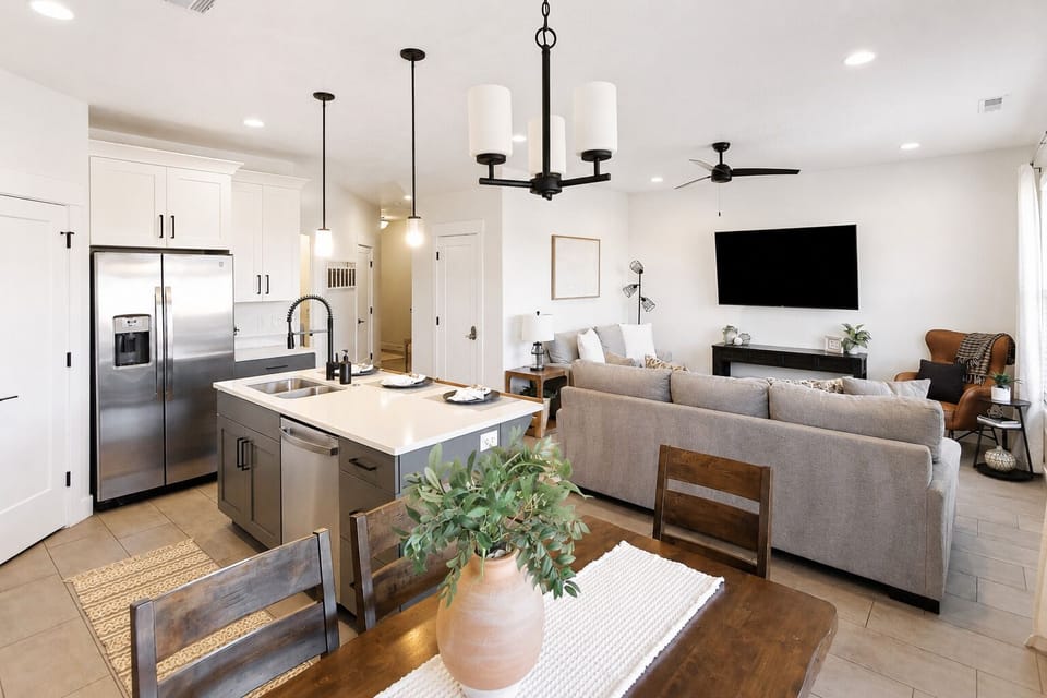 Bright open-concept kitchen and living room with island seating