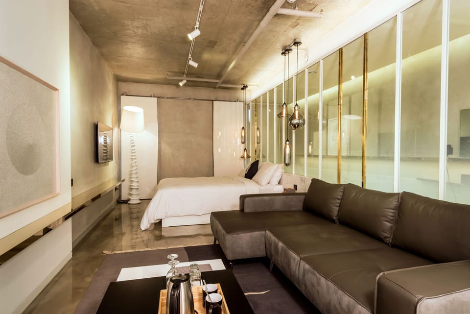Designers Suite | Down comforters, iron/ironing board, free WiFi