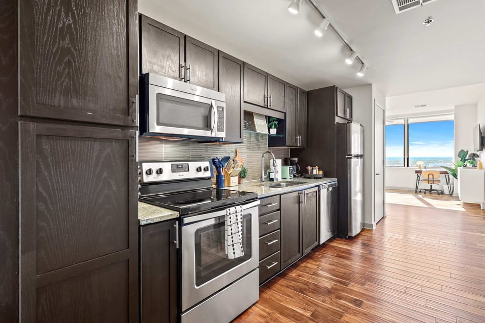 Bright and open, this inviting space flows seamlessly into the dining and living areas, creating a welcoming layout perfect for relaxing, entertaining, and enjoying time together. ✨🏡