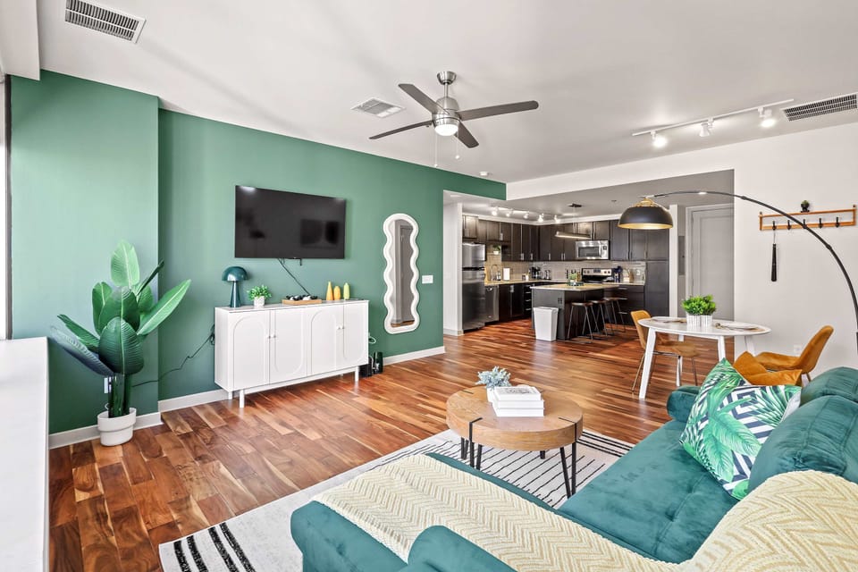 Entertainment-ready lounge with a Smart TV and sleek furnishings.  