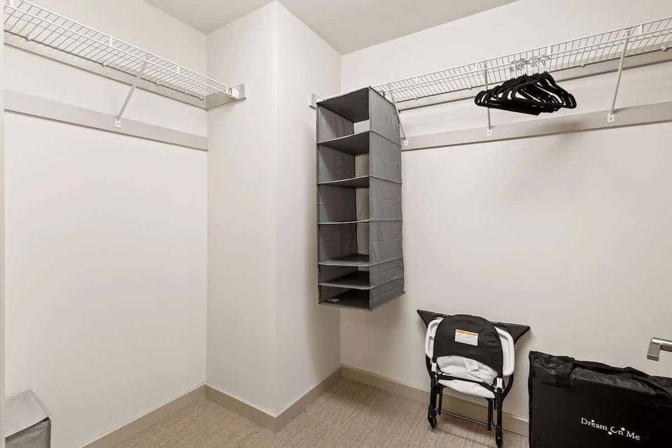 Ample storage space with built-in shelves and hangers to neatly organize clothes and travel essentials.