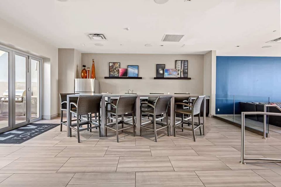 Gather for meals or coffee in the shared lounge area designed for comfort, connection, and great conversations.