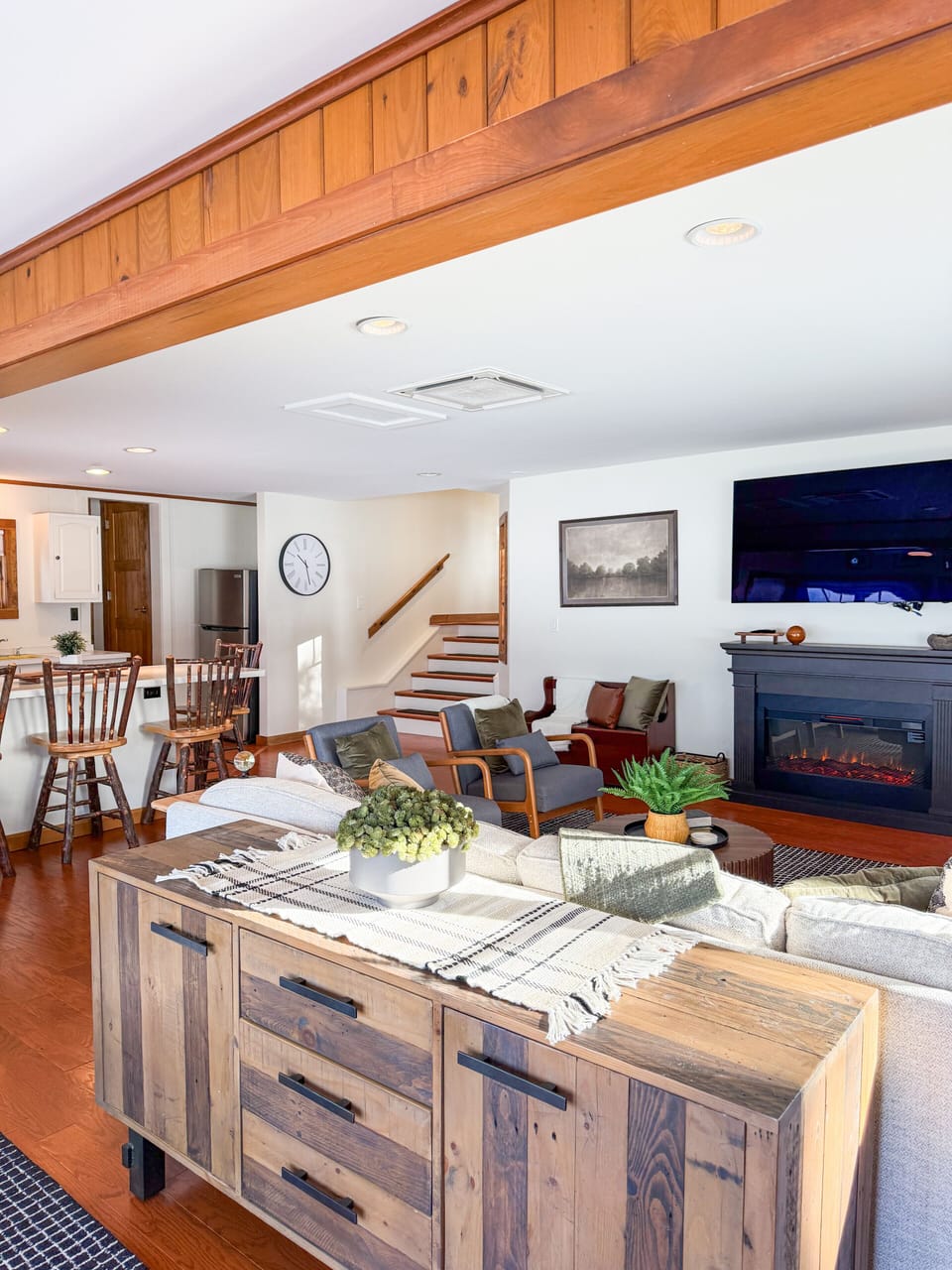 Kitchen & living room area with an electric fireplace
