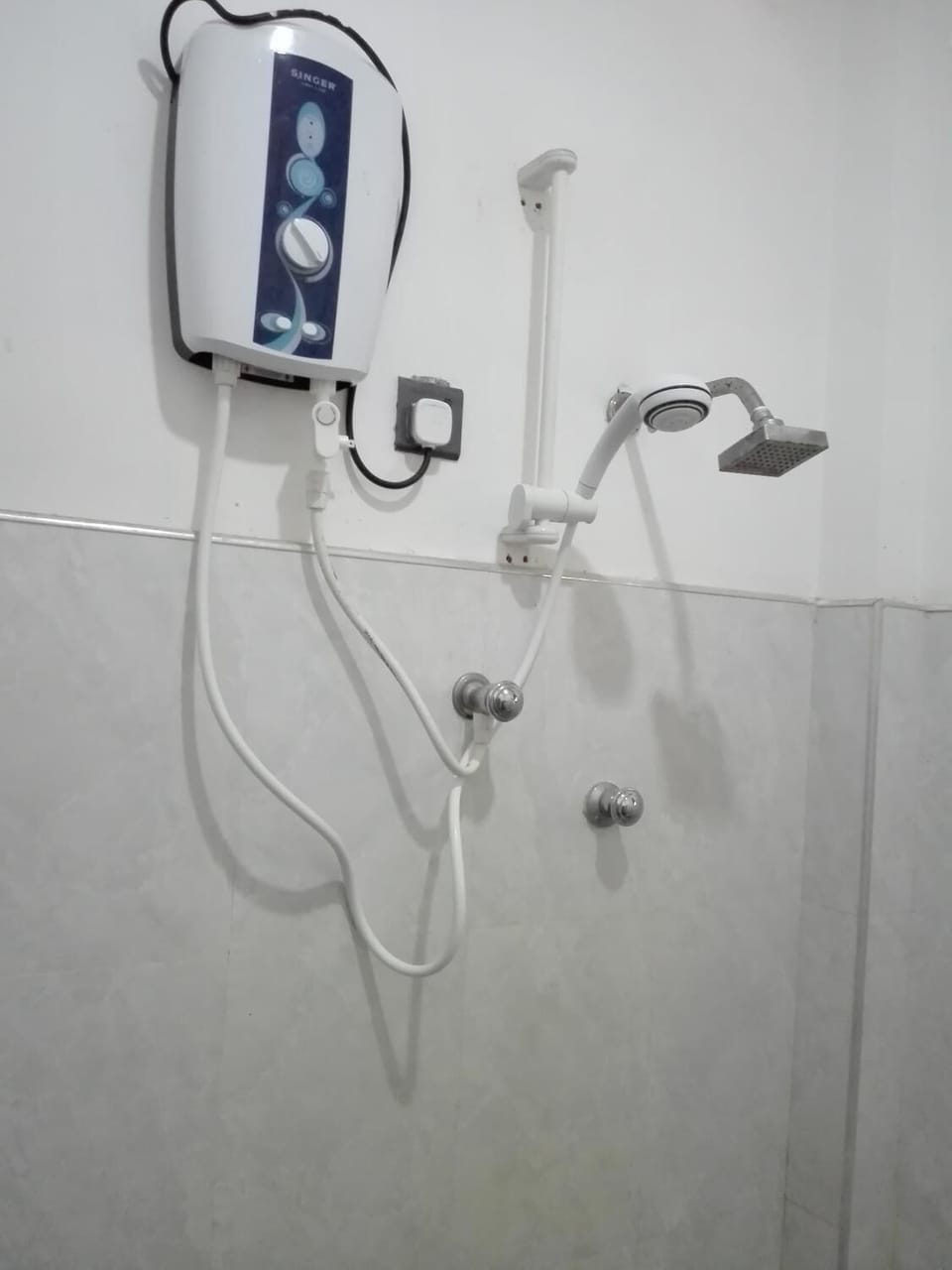 Shower, free toiletries, hair dryer, slippers