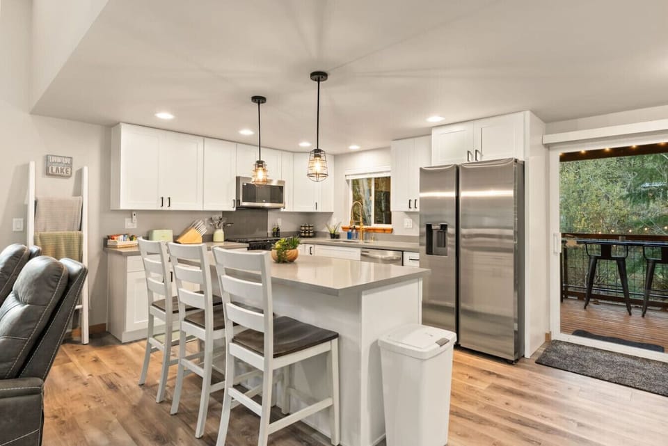 A bright, fully stocked kitchen where cooking together becomes part of the adventure!  Everything you need to prepare meals!