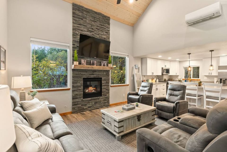 Enjoy the warm, inviting gathering space with vaulted ceilings—perfect for movie nights or relaxing after the trails!