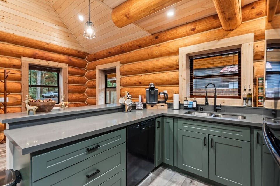 Gorgeous Kitchen with lots of counterspace, coffee station, dishwasher and everything you need to prepare meals!