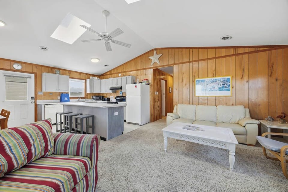 Top-level Living Room with Deck Access