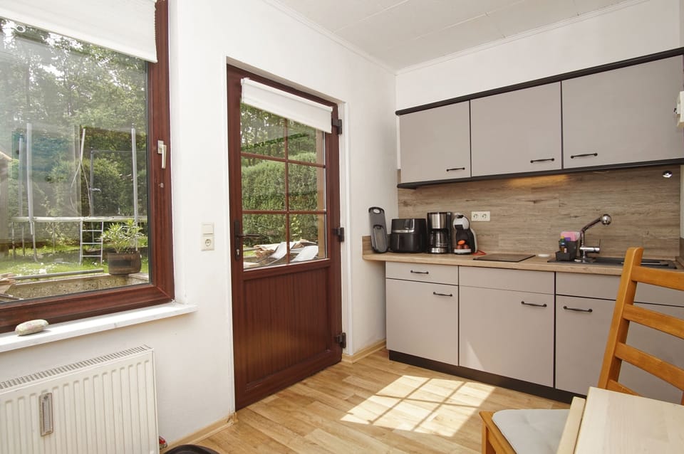 Apartment with Terrace, Bedroom, Kitchen incl.free access to pool and sauna nearby | Private kitchen | Fridge, electric kettle, toaster, highchair