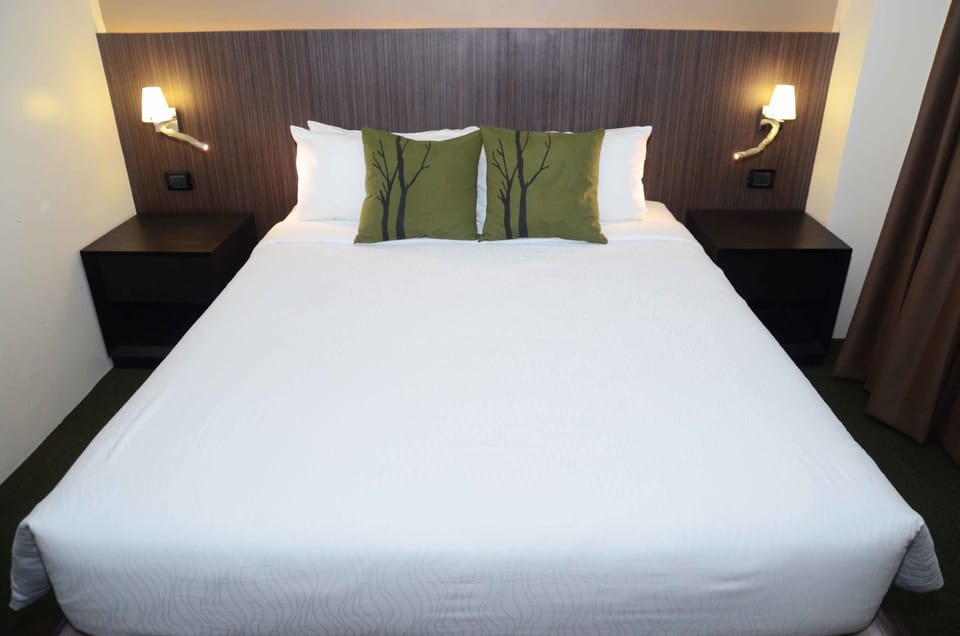 Signature Suite, 2 Bedrooms | Premium bedding, minibar, desk, blackout drapes