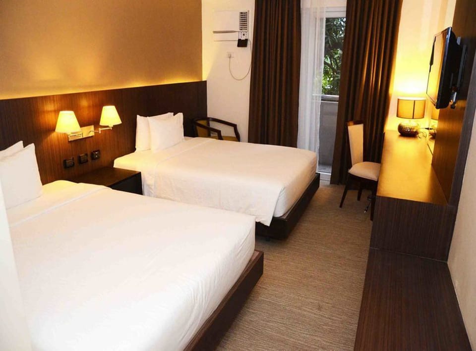 Deluxe Room | Premium bedding, minibar, desk, blackout drapes