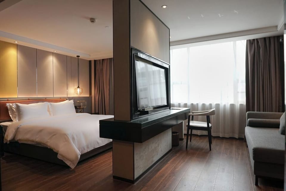 Executive Single Room, City View | In-room safe, desk, laptop workspace, blackout drapes