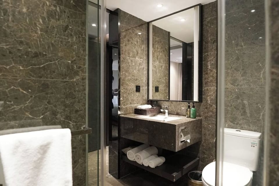 Comfort Single Room, City View | Bathroom | Shower, hair dryer, bathrobes, slippers