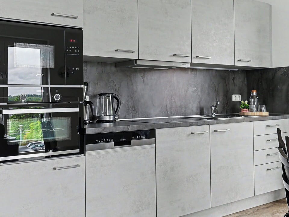 Kitchen Appliance, Kitchen, Cabinetry, Countertop, Major Appliance, Flooring, Home Appliance, Floor, Drawer, Interior Design