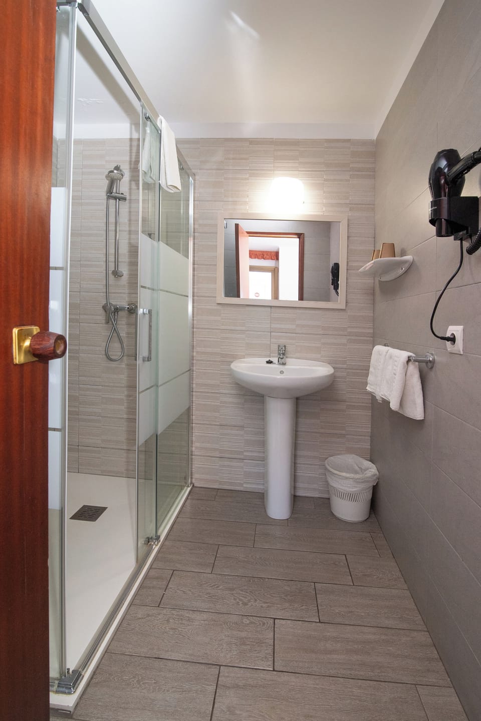 Shower, free toiletries, hair dryer (on request), towels