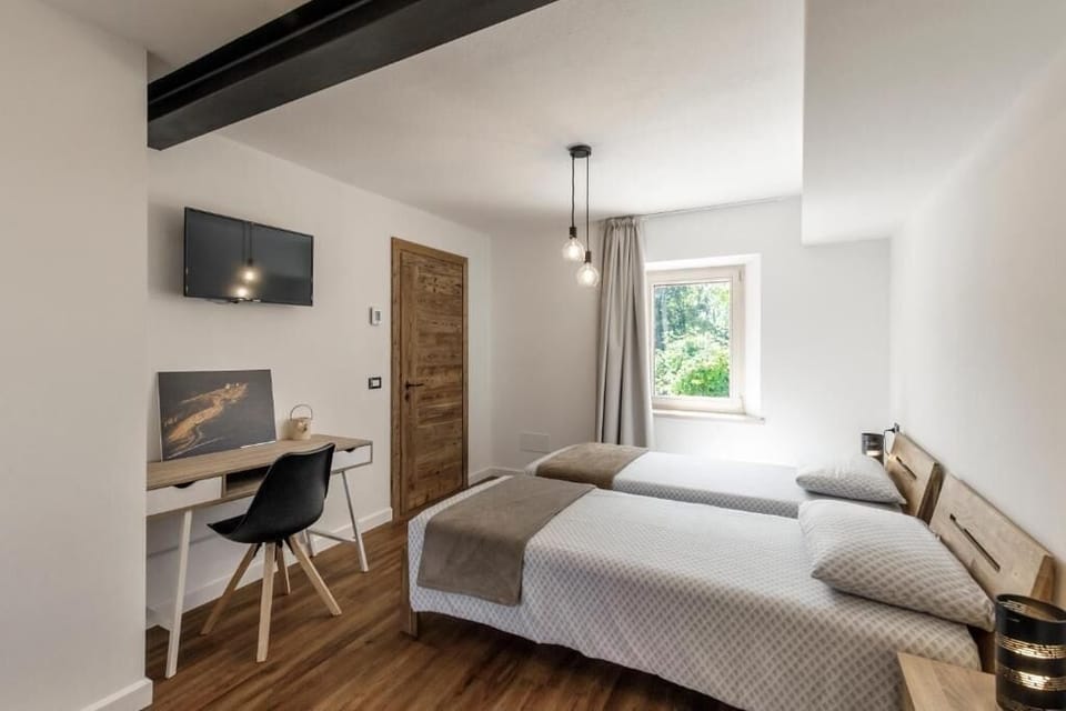 Triple Room, Balcony, Courtyard View | Blackout drapes, soundproofing, iron/ironing board, free WiFi