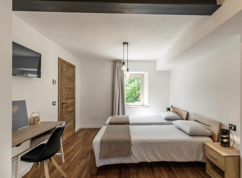 Triple Room, Balcony, Courtyard View | Blackout drapes, soundproofing, iron/ironing board, free WiFi