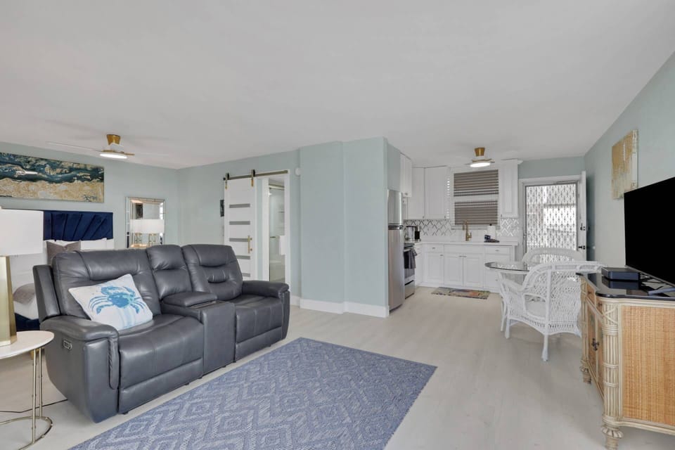 The studio features an open layout that seamlessly combines the living, dining, sleeping, and kitchen areas into one comfortable, well-designed space.