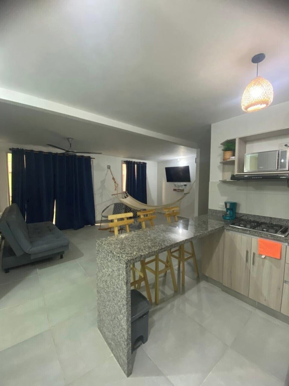 a view from the main door featuring the kitchen with living room