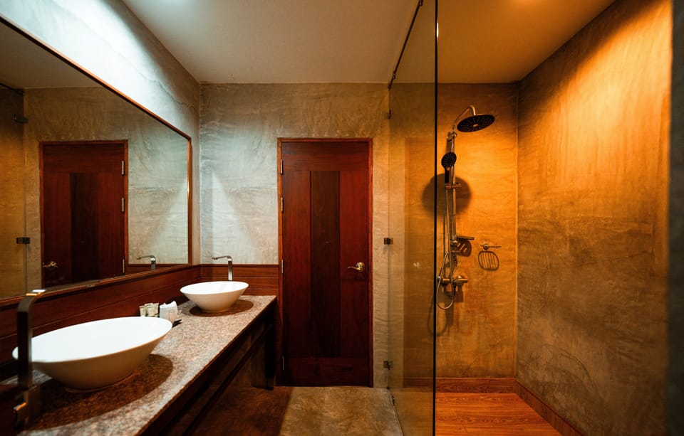 Deluxe Room, Mountain View | Bathroom | Shower, hair dryer, bathrobes, slippers