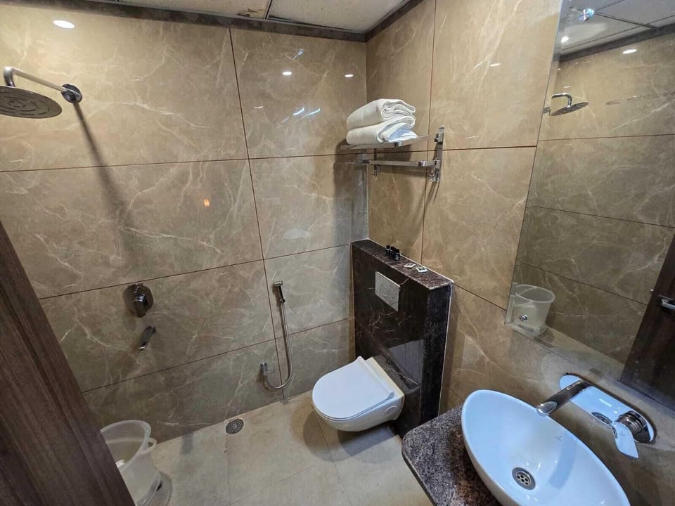 Shower, hair dryer (on request), towels, soap
