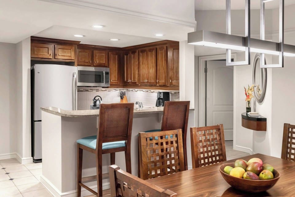 Separate dining area with extra seating at the counter.