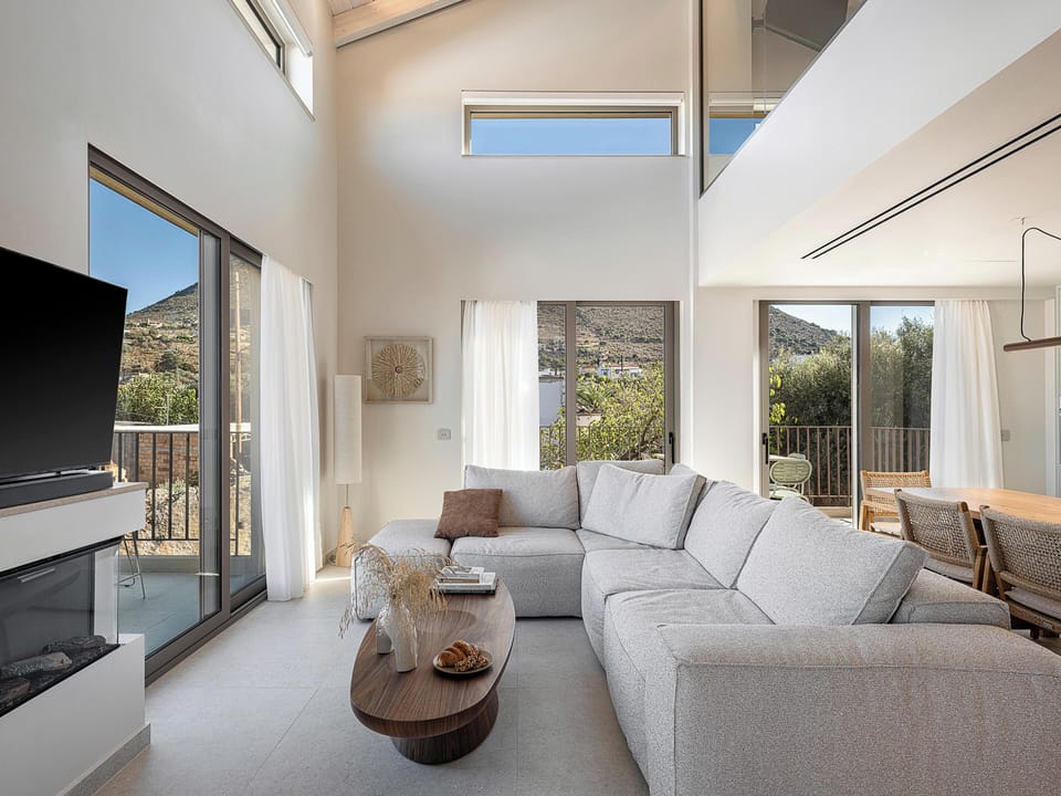 Luxury Villa, Sea View | Living area | 50-inch Smart TV with cable channels, fireplace, Netflix
