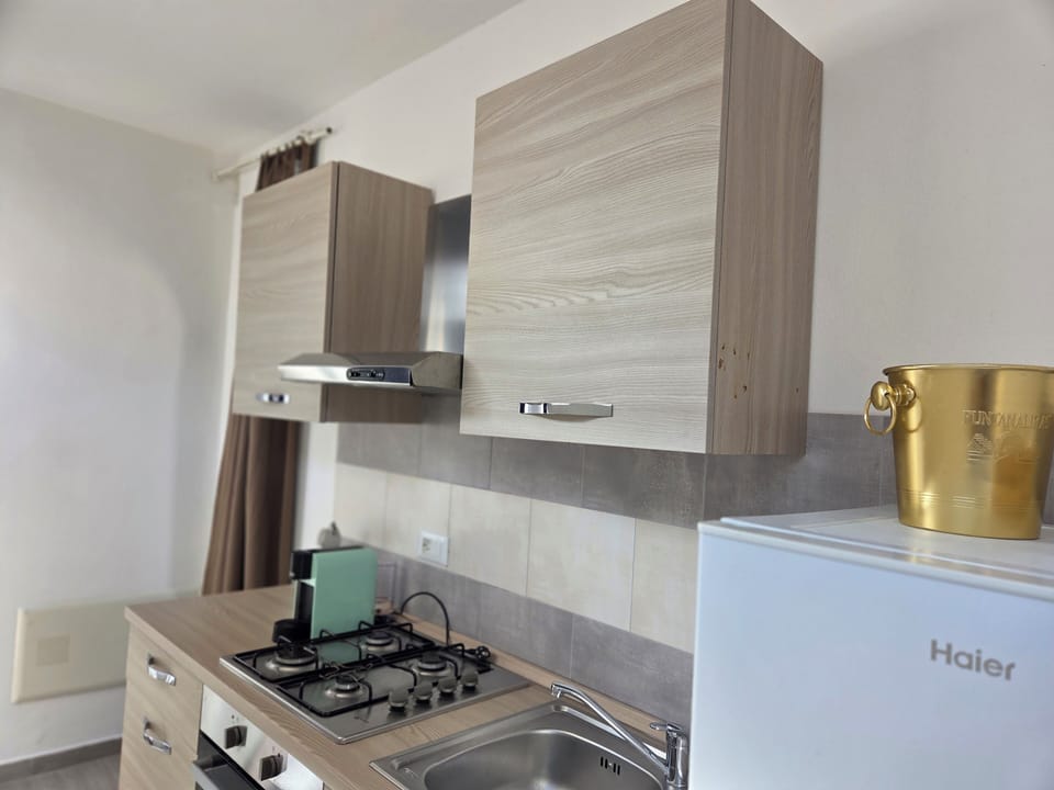 Comfort Triple Room, 1 Bedroom, Terrace, Sea View | Private kitchenette | Espresso maker, electric kettle