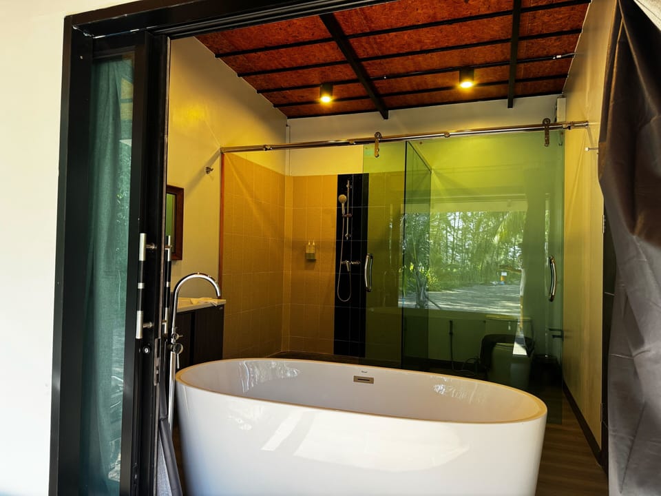 Double Room, Sea View | Bathroom | Hair dryer, slippers, towels, soap