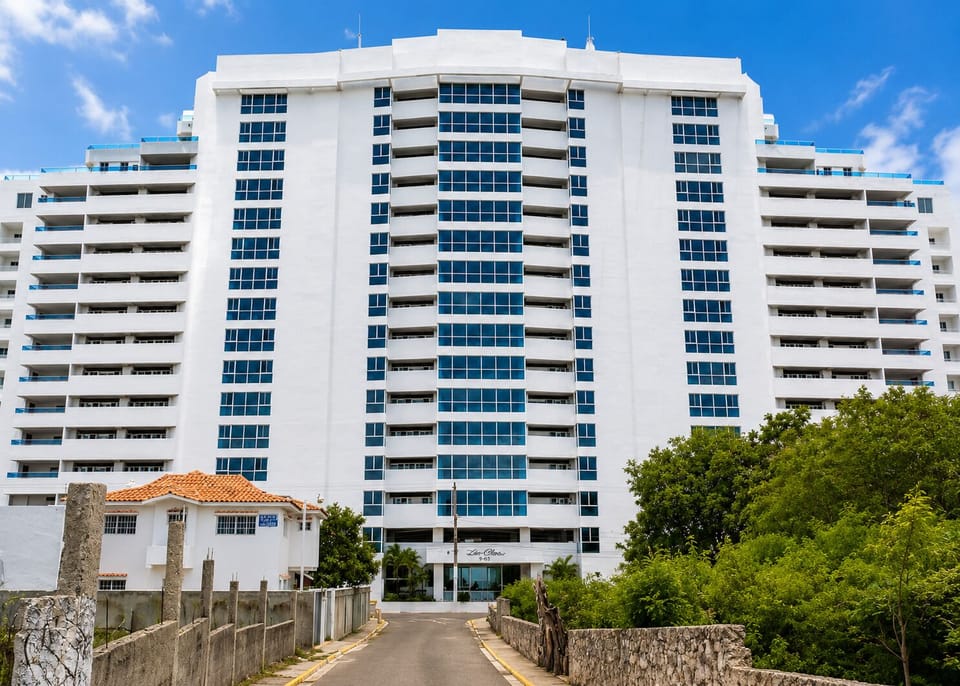 Las Olas condominium offers luxury amenities, including stunning infinity pools, a private bar, and a hotel-like reception.