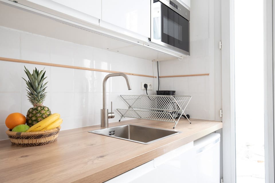 The kitchen is fully equipped to prepare a simple meal