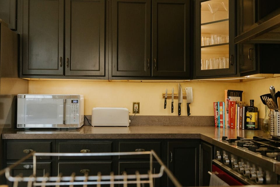 The kitchen is fully stocked and ready for you to make a full course meal or just warm up a pizza!